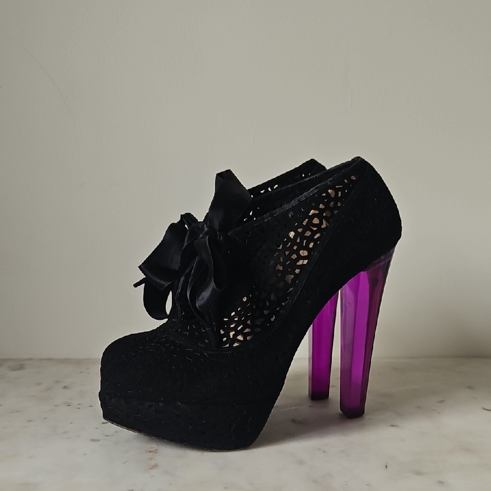 CHARLOTTE OLYMPIA: Black Suede Laser Cut Lace Satin Bow Lucite Heels